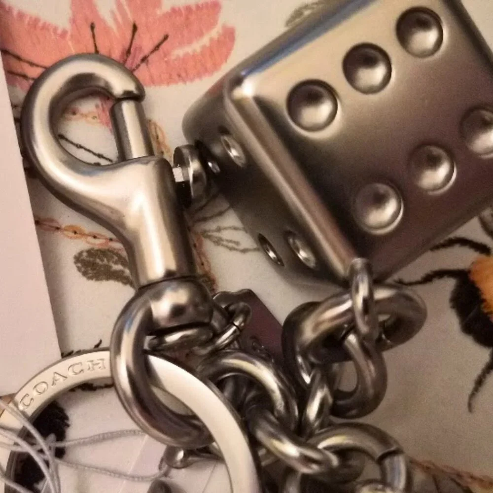 Coach Dice Bag Charm #CZ128 purchase comes with Coach dust bag